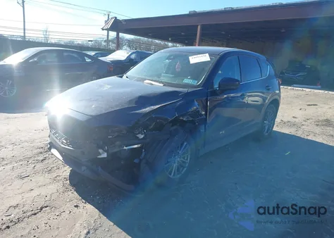 2021 Mazda Cx-5 Touring z USA, uszkodzony, nr VIN JM3KFBCM9M0327737